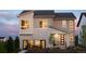 Inviting home showcasing a modern design, multiple windows, and well-maintained landscaping at 5726 Margarita Pt, Parker, CO 80134