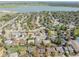 Aerial view shows this home's location in a neighborhood near the lake and with mountain views at 128 Baylor Dr, Longmont, CO 80503