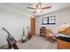 Bedroom with a ceiling fan, closet and natural light from the window at 128 Baylor Dr, Longmont, CO 80503