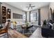 Spacious living room with sectional sofa and large windows at 12387 W 51St Ave, Wheat Ridge, CO 80033