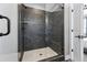 Large walk-in shower with modern fixtures and built-in bench at 12387 W 51St Ave, Wheat Ridge, CO 80033