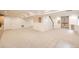 Spacious finished basement features recessed lighting, neutral carpet and staircase at 176 S Rosemary St, Denver, CO 80230