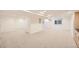 Finished basement with neutral carpet, recessed lights and ample space at 176 S Rosemary St, Denver, CO 80230