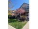 Attractive two-story home featuring a cozy front porch and beautiful landscaping, ideal for relaxing outdoors at 176 S Rosemary St, Denver, CO 80230