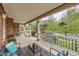 Relaxing front porch with comfortable seating, decorative plants, and views of the neighborhood, perfect for gatherings at 176 S Rosemary St, Denver, CO 80230