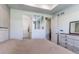 Bedroom featuring ensuite access, a large closet, and serene neutral decor at 39167 Braxton Ln, Elizabeth, CO 80107