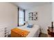 Cozy bedroom with a bright window and a neutral decor at 39167 Braxton Ln, Elizabeth, CO 80107