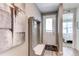 Welcoming entryway featuring a bench with coat hooks and decorative painting at 39167 Braxton Ln, Elizabeth, CO 80107