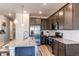 Modern kitchen featuring stainless steel appliances, granite countertops, and a center island at 39167 Braxton Ln, Elizabeth, CO 80107