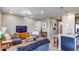 Comfortable living room seamlessly connected to the modern kitchen area at 39167 Braxton Ln, Elizabeth, CO 80107