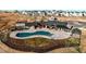 Community clubhouse with swimming pool and ample deck space for lounging and recreation at 39167 Braxton Ln, Elizabeth, CO 80107