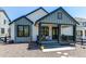 Charming home featuring a welcoming porch, dark trim, light grey siding and low maintenance landscaping at 39167 Braxton Ln, Elizabeth, CO 80107