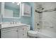 Bathroom features a tub, shower, updated vanity with ample storage, a mirror, and a medicine cabinet at 4542 S Quintero St, Aurora, CO 80015