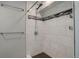 Bathroom showcasing an updated shower with tiled surround, and updated hardware at 4542 S Quintero St, Aurora, CO 80015