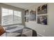 Charming bedroom featuring railroad-themed decor, a large window, and a comfortable bed at 1158 Sugarloaf Ln, Erie, CO 80516
