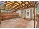 Private backyard patio featuring a pergola, stamped concrete, and fenced yard at 3612 Hudson St, Denver, CO 80207
