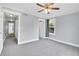 Spacious bedroom with carpeted floors and access to hallway at 3612 Hudson St, Denver, CO 80207