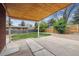 Backyard patio with a wood ceiling and view of fenced-in yard at 7192 W 67Th Pl, Arvada, CO 80003