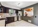 Updated kitchen with stainless steel appliances and a view to the Gathering room at 7192 W 67Th Pl, Arvada, CO 80003