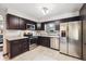 Modern kitchen with stainless steel appliances and plenty of counter space at 7192 W 67Th Pl, Arvada, CO 80003