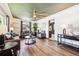 Comfortable living area featuring an open layout and modern decor at 7192 W 67Th Pl, Arvada, CO 80003