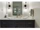 Modern bathroom with marble countertop, sleek vanity, and contemporary fixtures at 918 Dakota Dr, Castle Rock, CO 80108