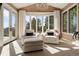 Sunlit sitting area with comfortable chairs, and view of nature at 918 Dakota Dr, Castle Rock, CO 80108