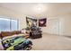 Spacious basement with a comfortable seating area and plenty of open space at 3680 S Gibralter Cir, Aurora, CO 80013