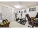 Finished basement space with exercise equipment and ample room for activities at 3680 S Gibralter Cir, Aurora, CO 80013