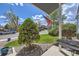View from the covered front porch with landscaping and an American flag on display at 3680 S Gibralter Cir, Aurora, CO 80013
