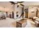 Open concept floor plan featuring living area, dining area, and stairs to the second floor at 3680 S Gibralter Cir, Aurora, CO 80013