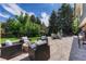 The backyard features a patio with built in fire pit and seating at 10289 E Berry Dr, Greenwood Village, CO 80111