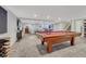 The basement offers a pool table and lots of open space at 10289 E Berry Dr, Greenwood Village, CO 80111