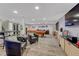 Open basement featuring luxury vinyl flooring, a pool table, bar and sitting area, great for entertaining guests at 10289 E Berry Dr, Greenwood Village, CO 80111