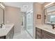 Elegant bathroom with double vanities, glass-enclosed shower, and sophisticated design at 10289 E Berry Dr, Greenwood Village, CO 80111