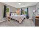 Cozy bedroom with plush carpet, natural light, and comfortable furnishings at 10289 E Berry Dr, Greenwood Village, CO 80111