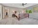 Comfortable bedroom featuring neutral paint colors, natural light, and soft carpet at 10289 E Berry Dr, Greenwood Village, CO 80111
