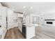 Beautiful modern kitchen with island, stainless appliances, and hardwood flooring at 9266 Telluride Ct, Commerce City, CO 80022