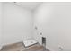 Unfinished laundry room featuring utility sink connections and modern flooring at 9266 Telluride Ct, Commerce City, CO 80022