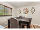 Cozy dining room featuring a modern table, seating for four, and decorative wall accents at 9221 High St, Thornton, CO 80229