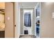 View of bathroom with tiled floor from hallway at 9221 High St, Thornton, CO 80229
