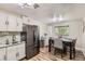 Modern kitchen featuring stainless steel appliances, granite countertops, and a dining area at 9221 High St, Thornton, CO 80229