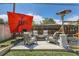 Outdoor patio area with comfortable seating and a heater at 9221 High St, Thornton, CO 80229