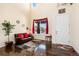 Bright and airy foyer boasts hardwood floors and a soaring two-story ceiling at 11460 W Tanforan Cir, Littleton, CO 80127