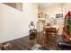 Open-concept living room featuring a grand staircase and great natural light at 11460 W Tanforan Cir, Littleton, CO 80127