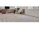 Finished basement with neutral carpet, entertainment space, window view, and recessed lighting at 7325 S Waterloo Way, Aurora, CO 80016
