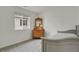 Cozy bedroom with window view, vintage dresser, and a comfortable bed at 7325 S Waterloo Way, Aurora, CO 80016