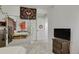 Bright bedroom with a large mirrored closet and neutral carpeting at 7325 S Waterloo Way, Aurora, CO 80016