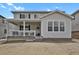Charming home with a covered porch and well-maintained yard at 7325 S Waterloo Way, Aurora, CO 80016