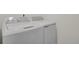 Laundry room featuring a GE washer and dryer at 7325 S Waterloo Way, Aurora, CO 80016